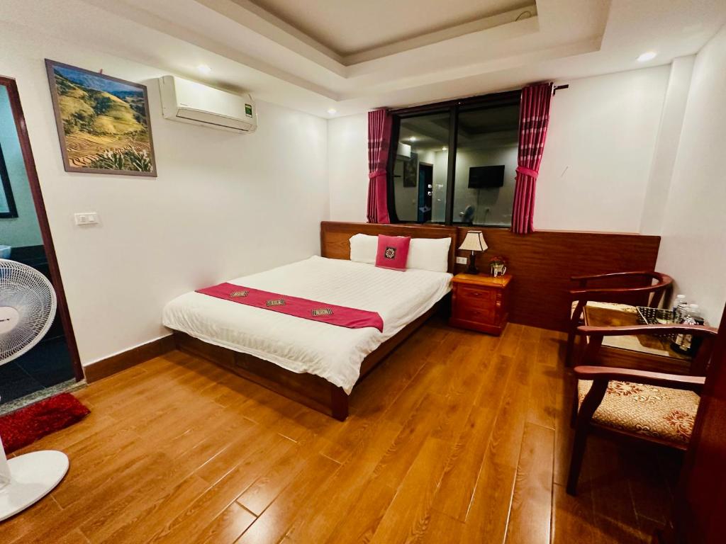 Postel nebo postele na pokoji v ubytování Thanh Quyen hotel
