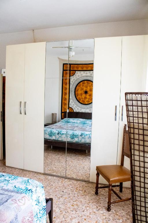 Postel nebo postele na pokoji v ubytování L'isola felice