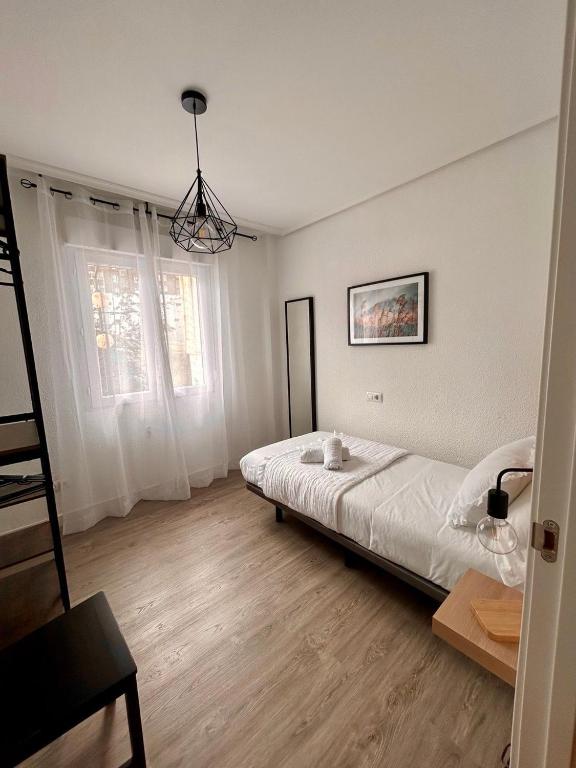 Postel nebo postele na pokoji v ubytování En el corazón de Santander