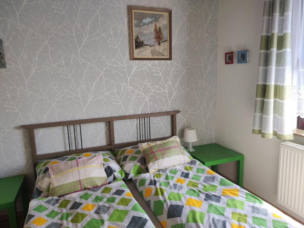 Postel nebo postele na pokoji v ubytování Apartmány Brevant