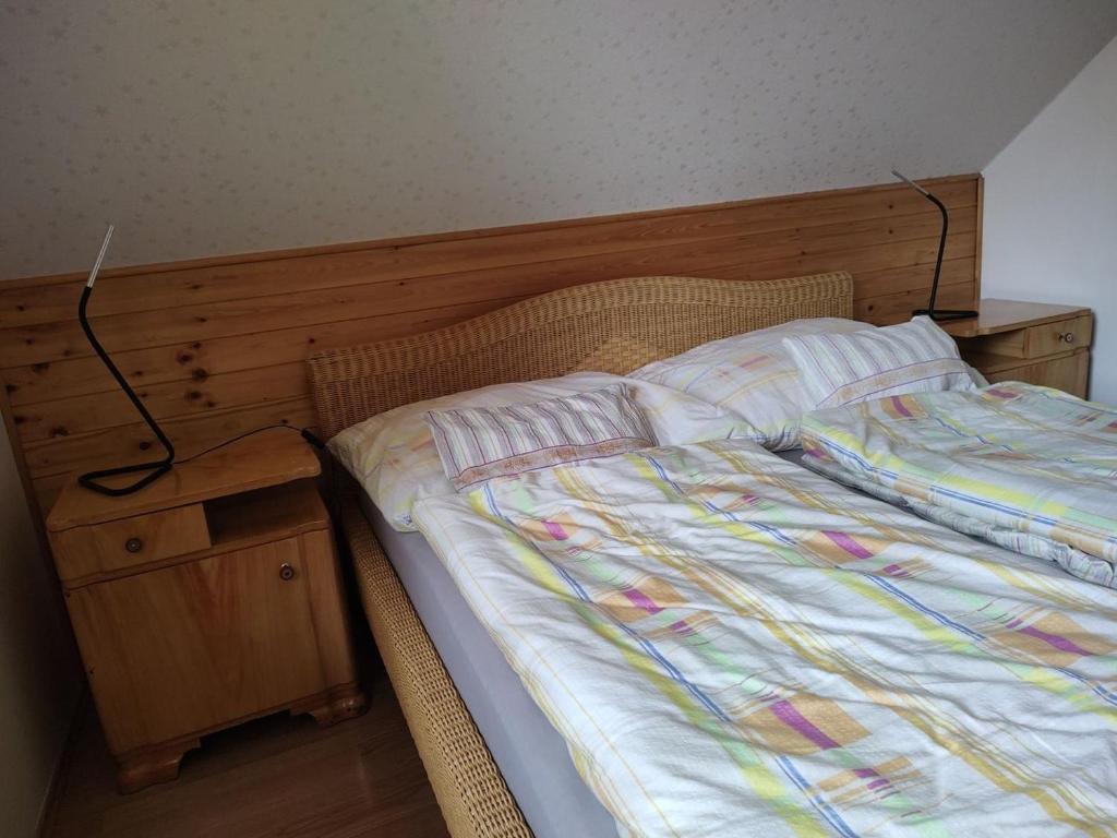 Postel nebo postele na pokoji v ubytování Apartmány Brevant