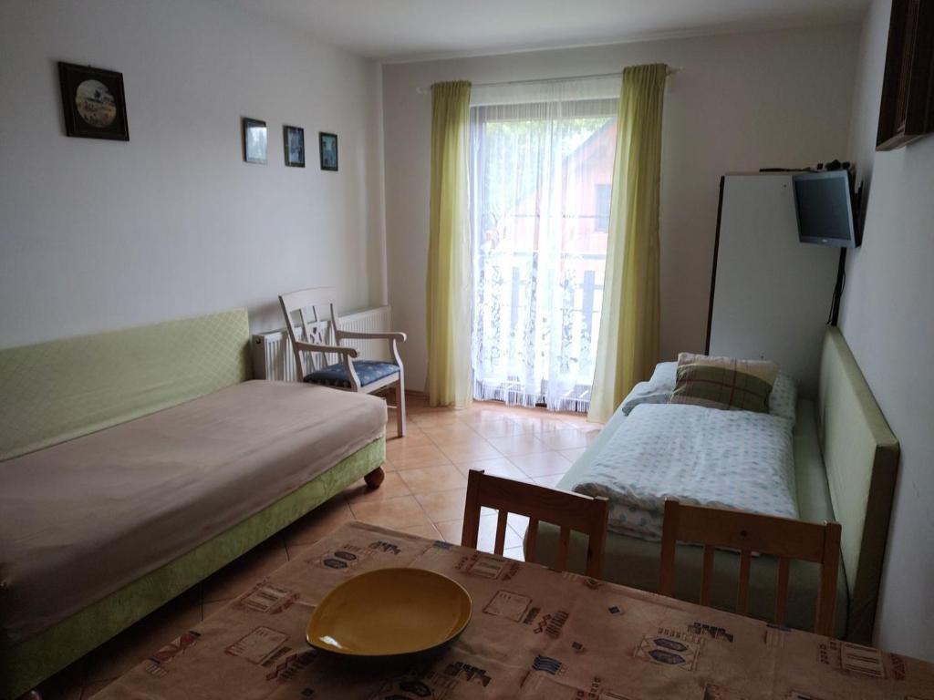 Postel nebo postele na pokoji v ubytování Apartmány Brevant