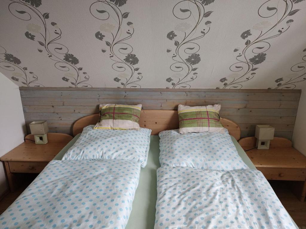 Postel nebo postele na pokoji v ubytování Apartmány Brevant