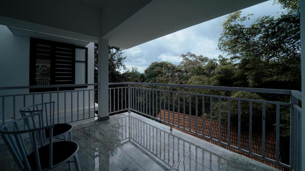 Balkón nebo terasa v ubytování Vythiri Holiday Resort, Wayanad