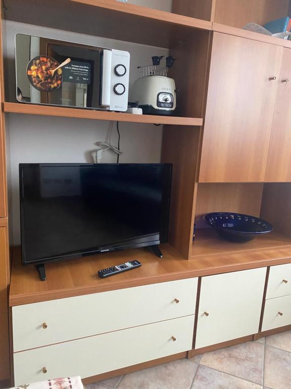 TV a/nebo společenská místnost v ubytování Casa Silvana