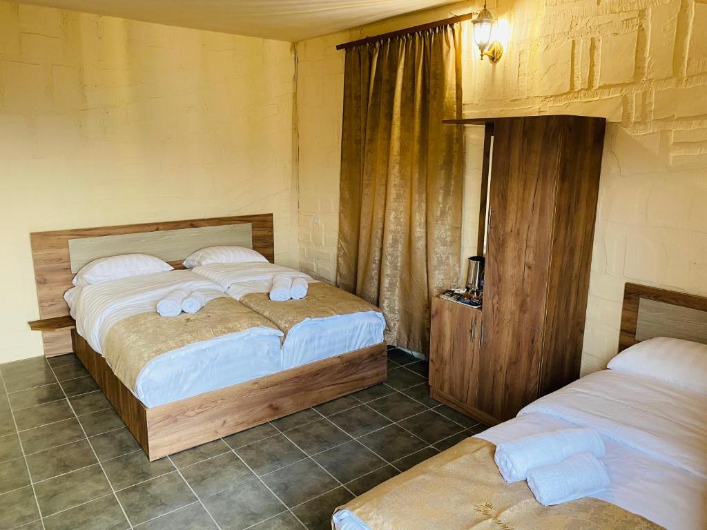 Un ou plusieurs lits dans un hébergement de l'établissement Shahunts Resort