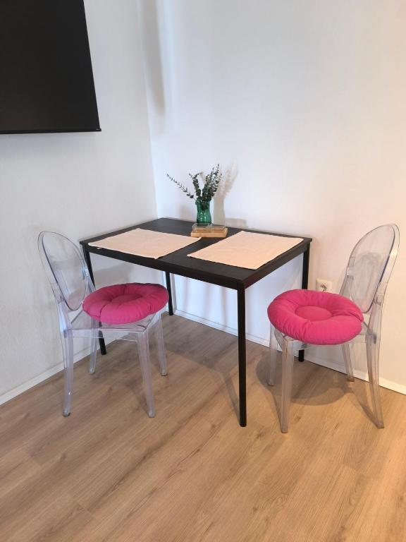 Telewizja i/lub zestaw kina domowego w obiekcie Apartment and Rooms Vilma