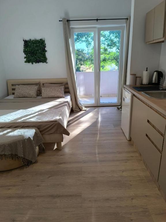 Kuchnia lub aneks kuchenny w obiekcie Apartment and Rooms Vilma