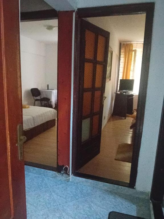 Ένα ή περισσότερα κρεβάτια σε δωμάτιο στο Apartament Neptun
