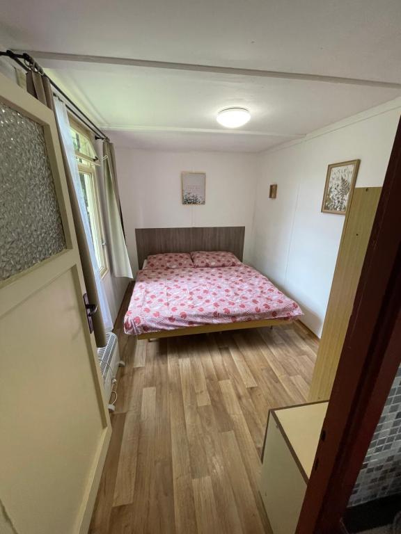 Postel nebo postele na pokoji v ubytování Chaty Kašperské Hory