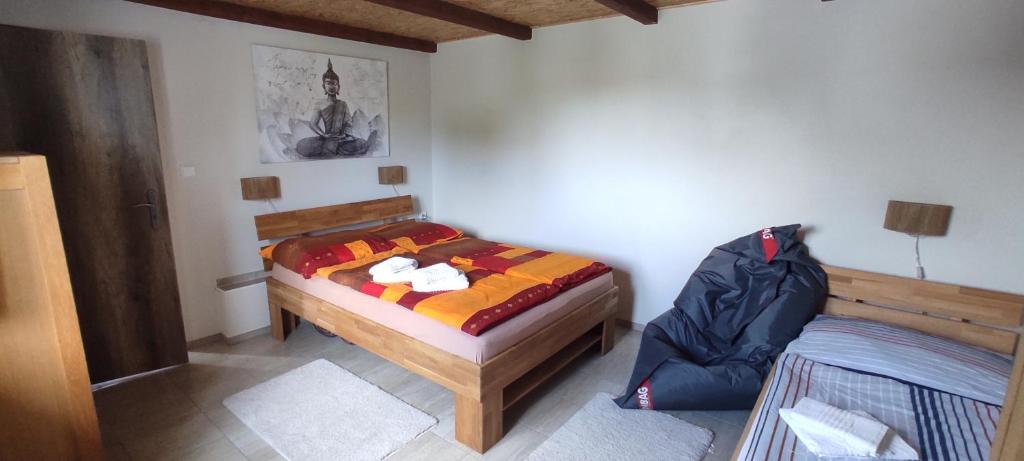 Postel nebo postele na pokoji v ubytování Ubytování U nás na Moravě