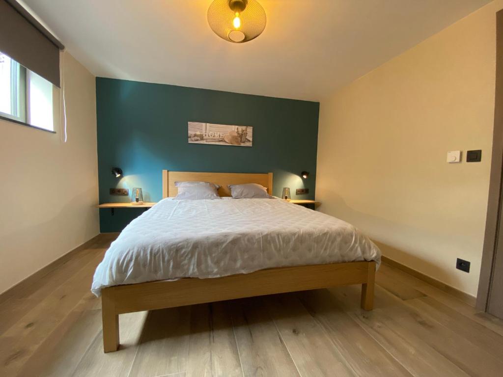 Postel nebo postele na pokoji v ubytování Gîte de la Tour