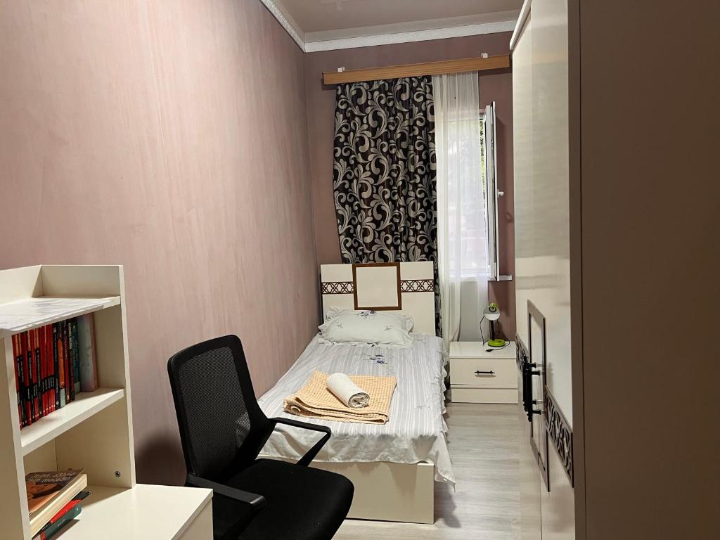 Postel nebo postele na pokoji v ubytování საოჯახო სასტუმრო დეა