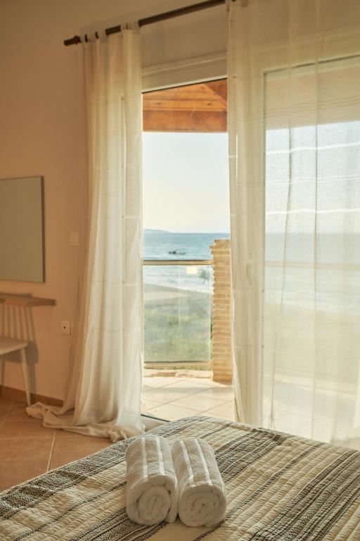 Postel nebo postele na pokoji v ubytování Royal Sea View Villa