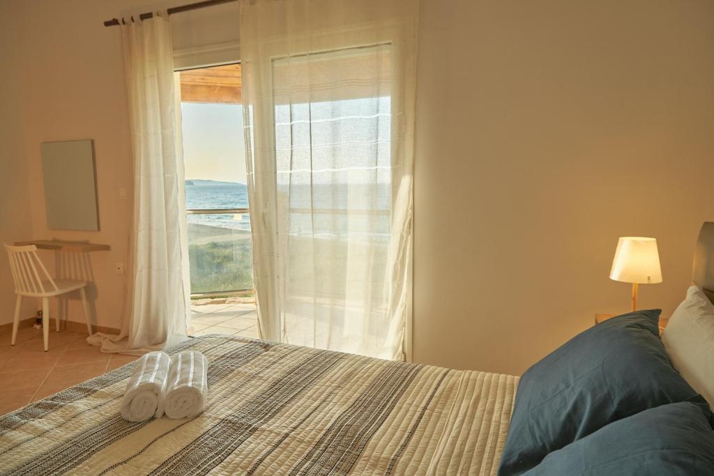 Postel nebo postele na pokoji v ubytování Royal Sea View Villa