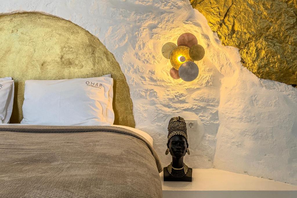 Postel nebo postele na pokoji v ubytování Onar Suites & Villas