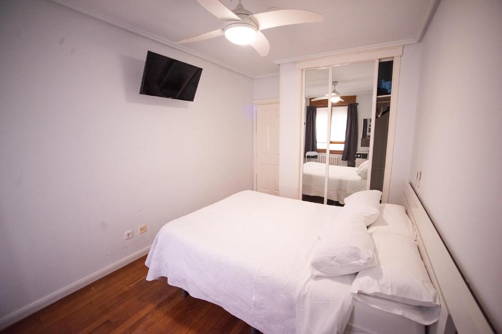 Postel nebo postele na pokoji v ubytování Apartacentro
