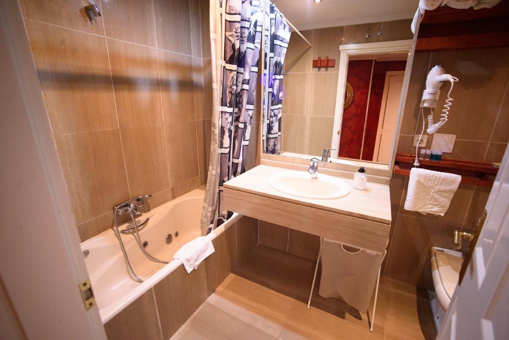 Koupelna v ubytování Apartacentro