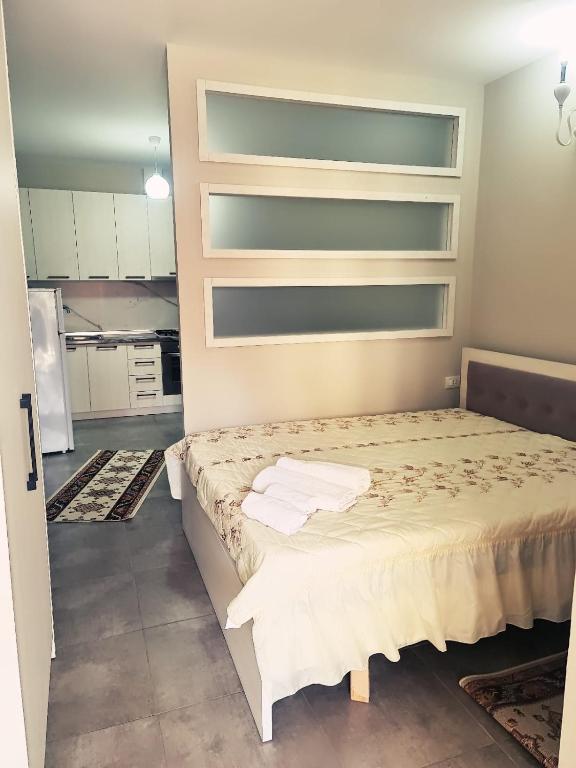 Postel nebo postele na pokoji v ubytování Beach Gem