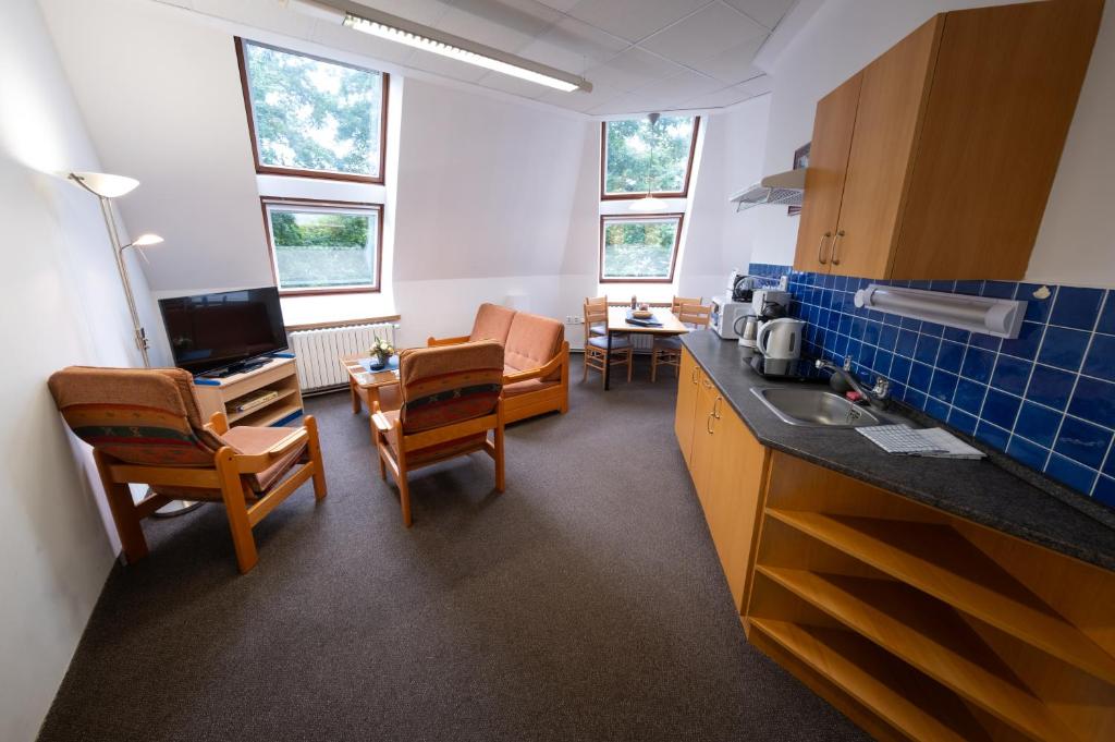 Kuchyň nebo kuchyňský kout v ubytování IT Centrum Apartments