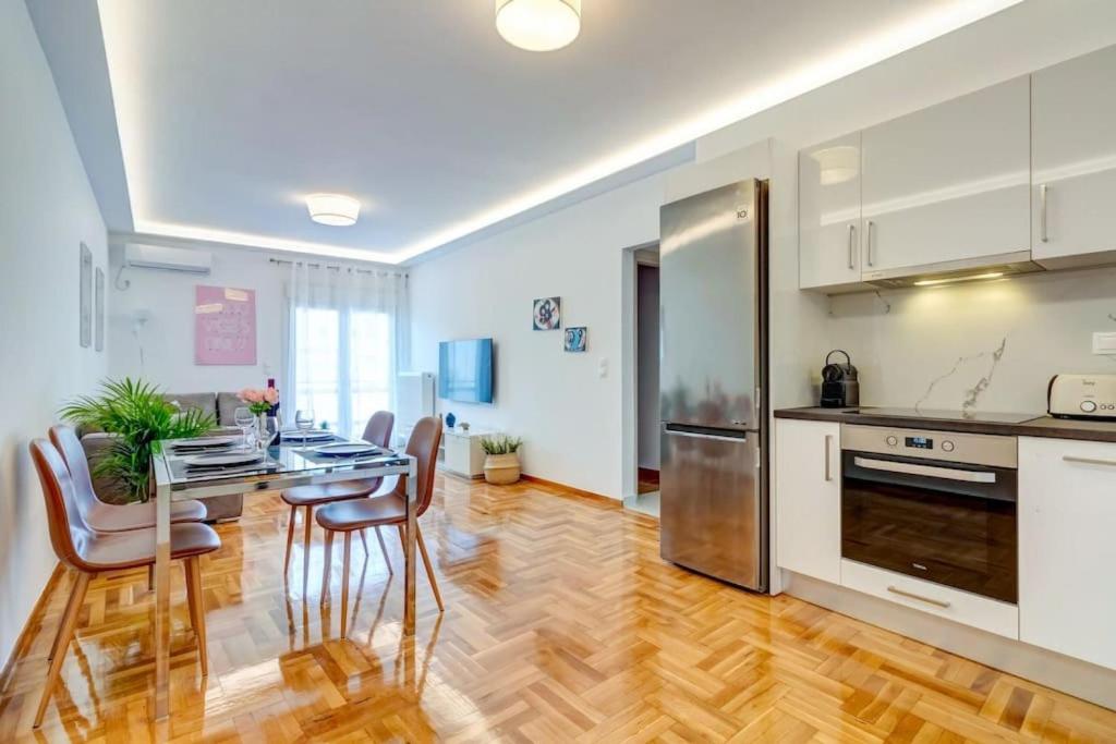 A kitchen or kitchenette at Koukaki lux 2BD 1master ap next to Acropolis