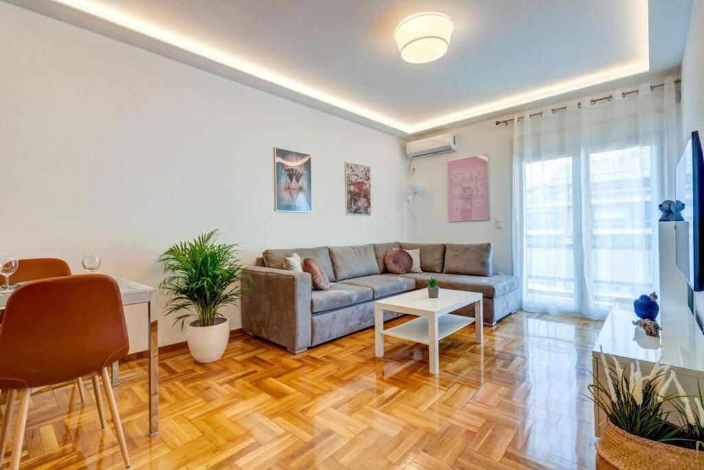 A seating area at Koukaki lux 2BD 1master ap next to Acropolis