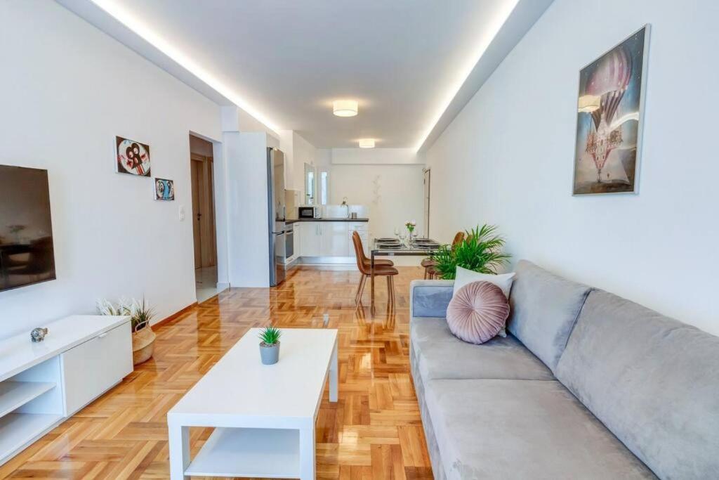 A seating area at Koukaki lux 2BD 1master ap next to Acropolis