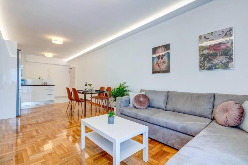 A seating area at Koukaki lux 2BD 1master ap next to Acropolis