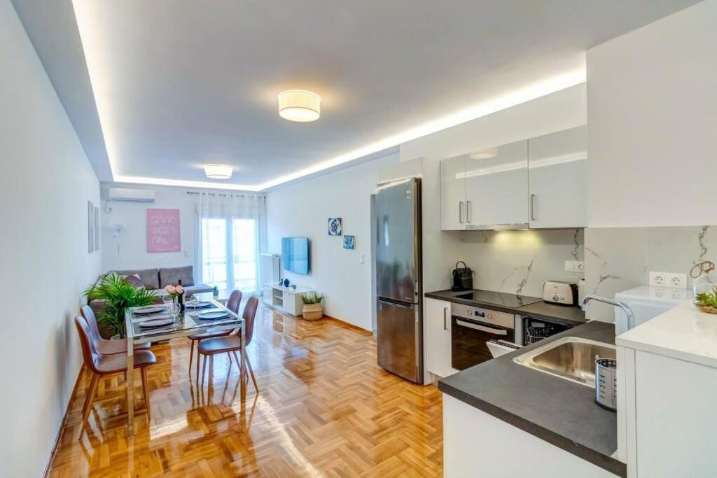 A kitchen or kitchenette at Koukaki lux 2BD 1master ap next to Acropolis