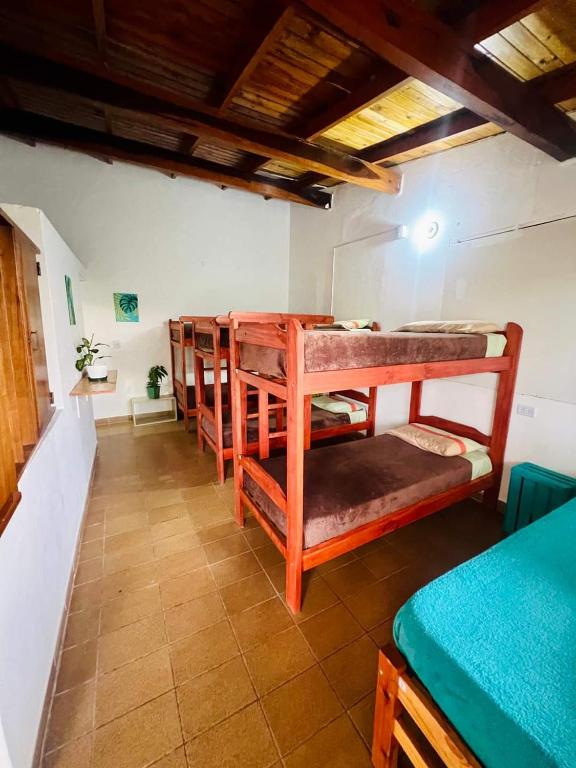 Postel nebo postele na pokoji v ubytování Benteveo hostel iguazu