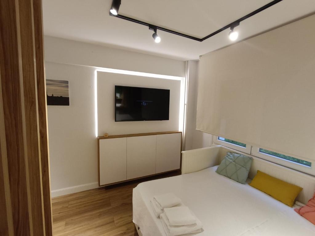 Postel nebo postele na pokoji v ubytování Precioso loft a 600m de la catedral