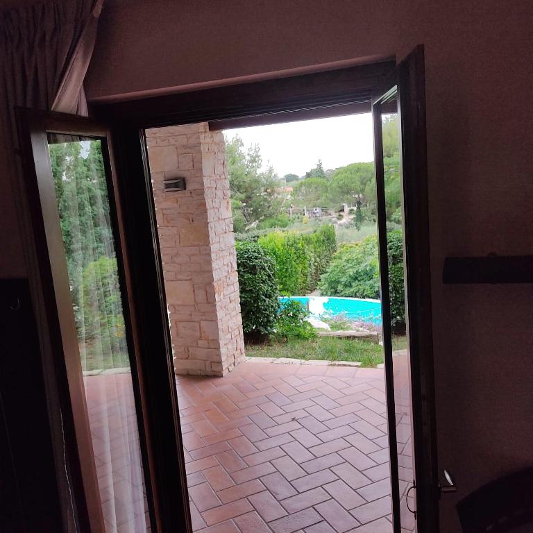 Bazén v ubytování Maglioferro Residence nebo v jeho okolí
