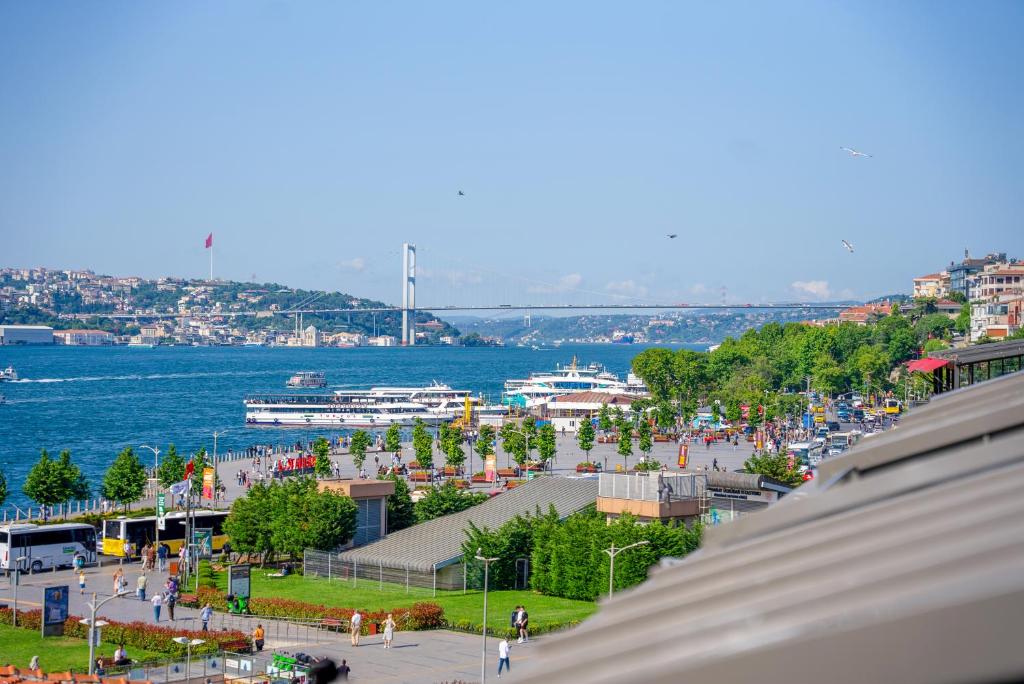 a view of a harbor with boats in the water at The Palm Bosphorus Hotel in Istanbul