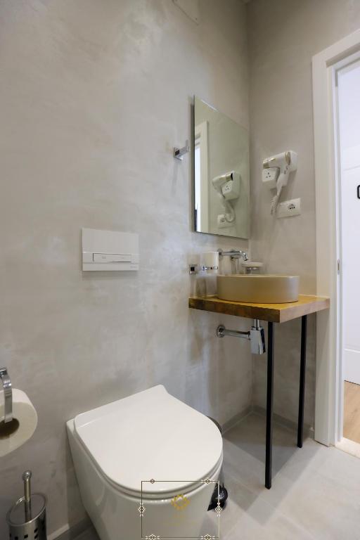 Koupelna v ubytování HM Boutique Hotel