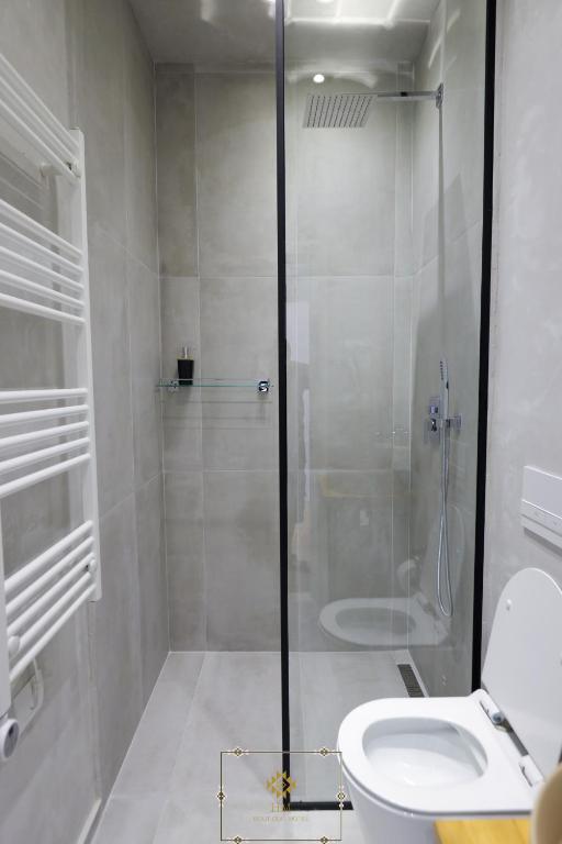 Koupelna v ubytování HM Boutique Hotel