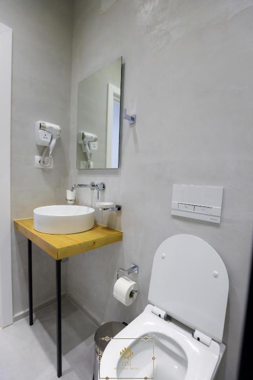 Koupelna v ubytování HM Boutique Hotel