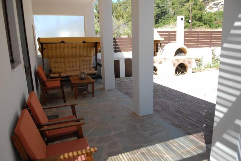 Posezení v ubytování Hara House in Monolithos Rhodes