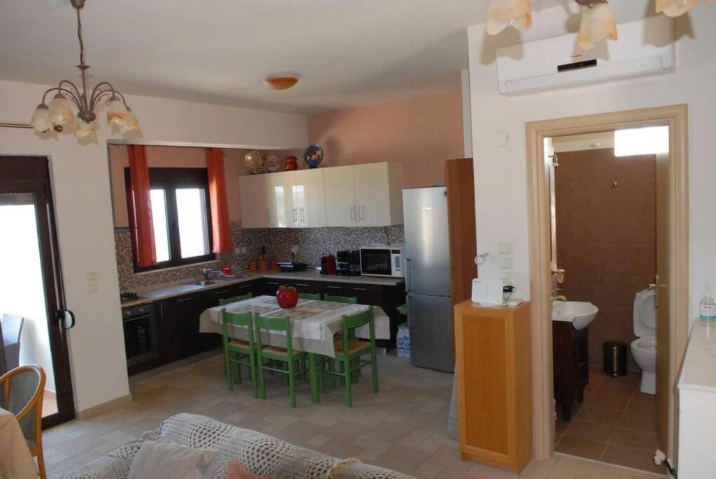 Kuchyň nebo kuchyňský kout v ubytování Hara House in Monolithos Rhodes