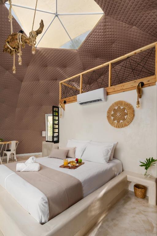 Postel nebo postele na pokoji v ubytování Gogna luxury domes