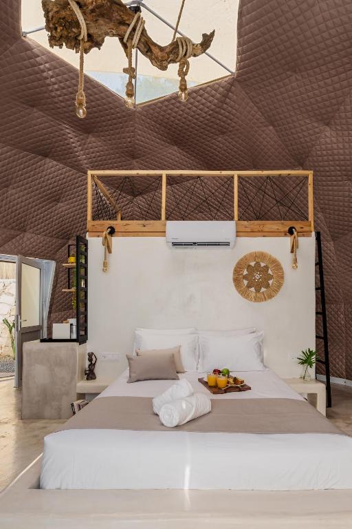 Postel nebo postele na pokoji v ubytování Gogna luxury domes