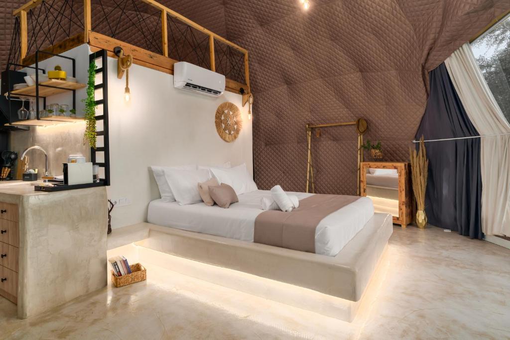 Postel nebo postele na pokoji v ubytování Gogna luxury domes