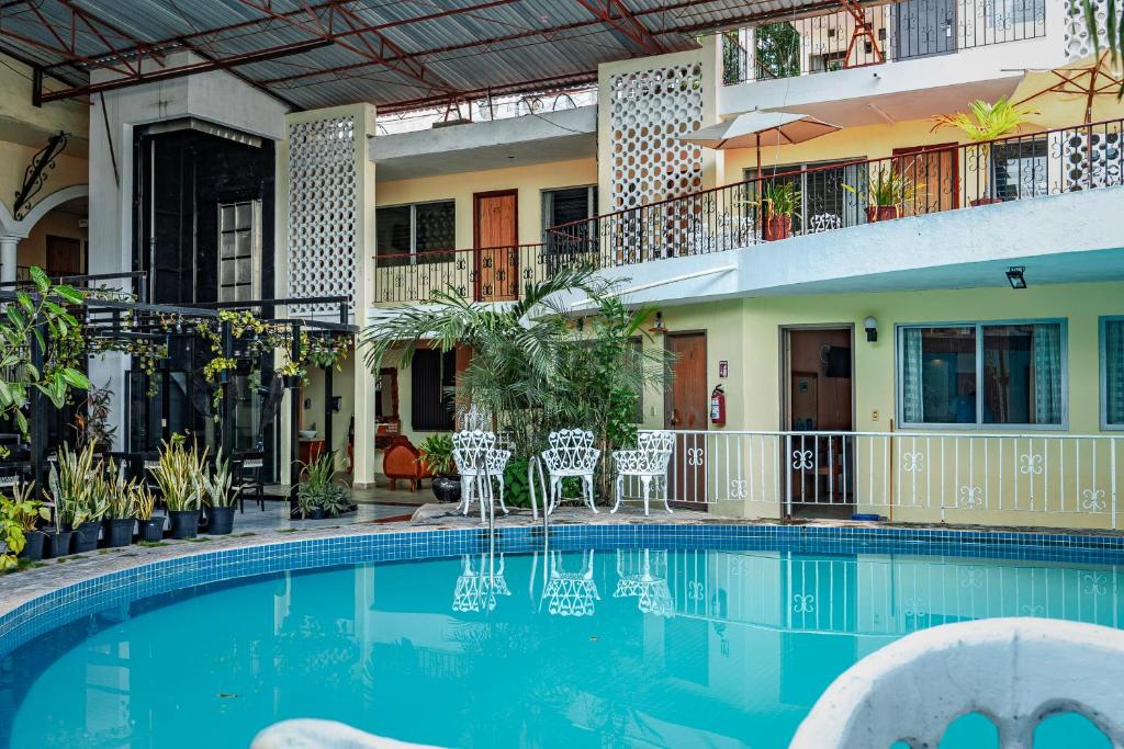 Bazén v ubytování Hotel María de la Luz nebo v jeho okolí
