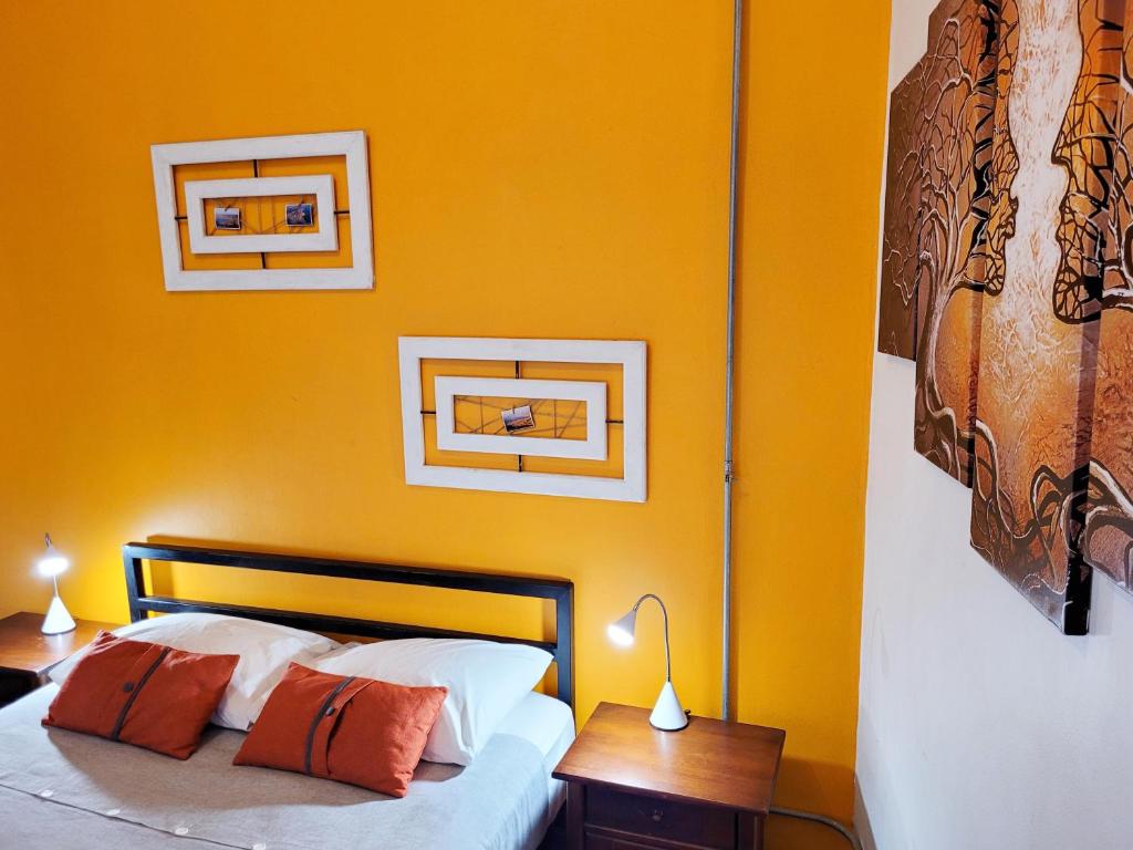 Postel nebo postele na pokoji v ubytování Maki Hostels & Suites Valparaiso