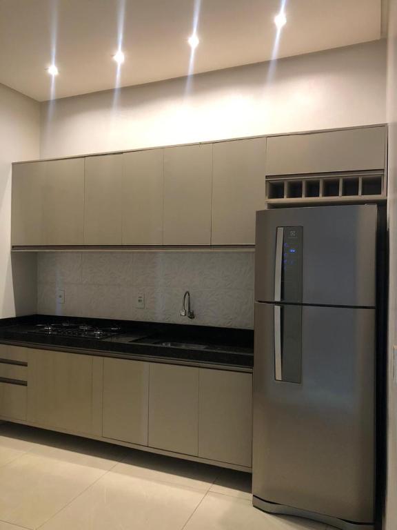 Kuchyň nebo kuchyňský kout v ubytování Pousada e Lofts Marabá Quarto 4