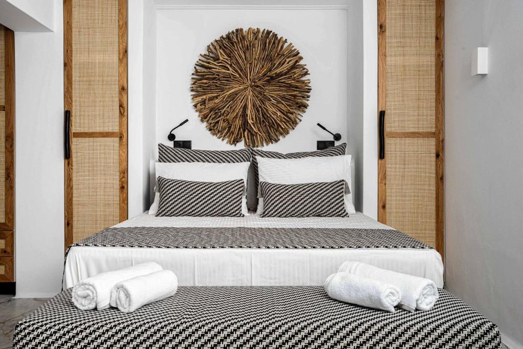 Posteľ alebo postele v izbe v ubytovaní K Town Suites Naxos