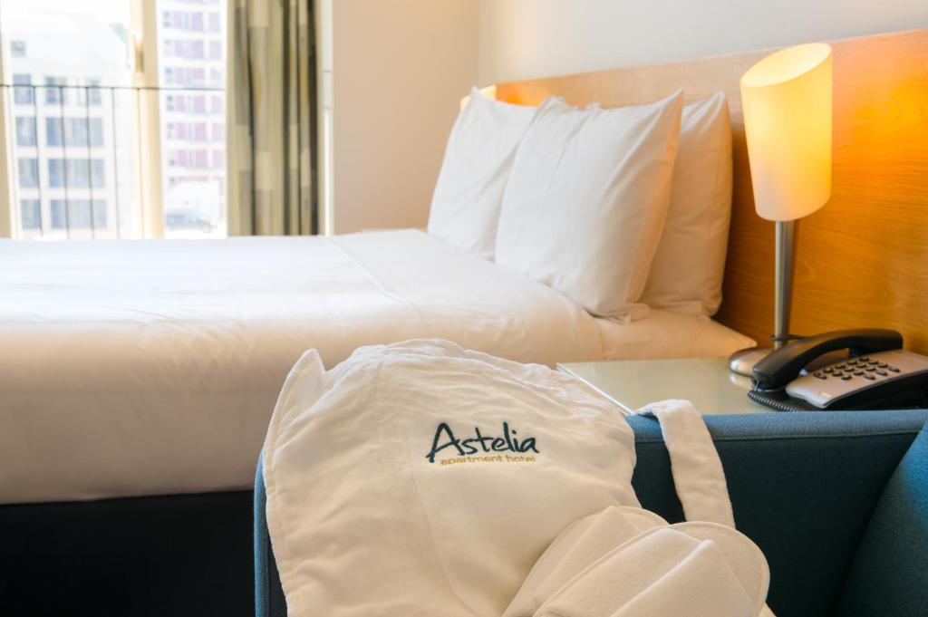 Postel nebo postele na pokoji v ubytování Astelia Apartment Hotel