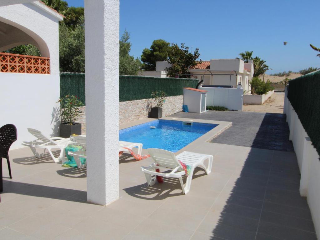 Bazén v ubytování Vacaciones perfectas cerca del mar: piscina privada, mascotas bienvenidas y playa para perros. - ES-184-21 nebo v jeho okolí