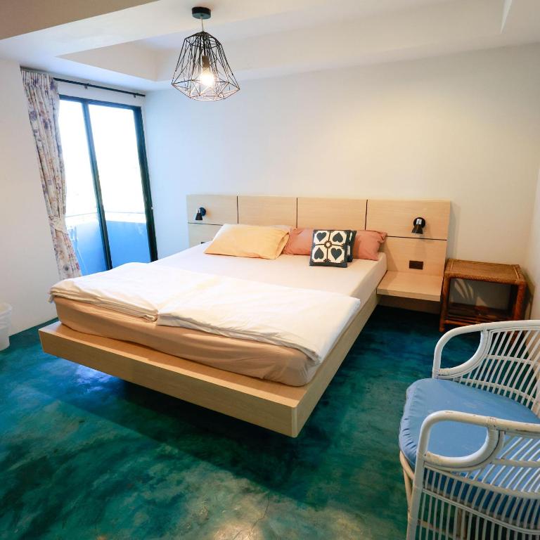 Postel nebo postele na pokoji v ubytování Huahin Place Guest House
