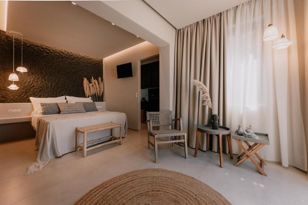 Postel nebo postele na pokoji v ubytování ONYM Curated Villas