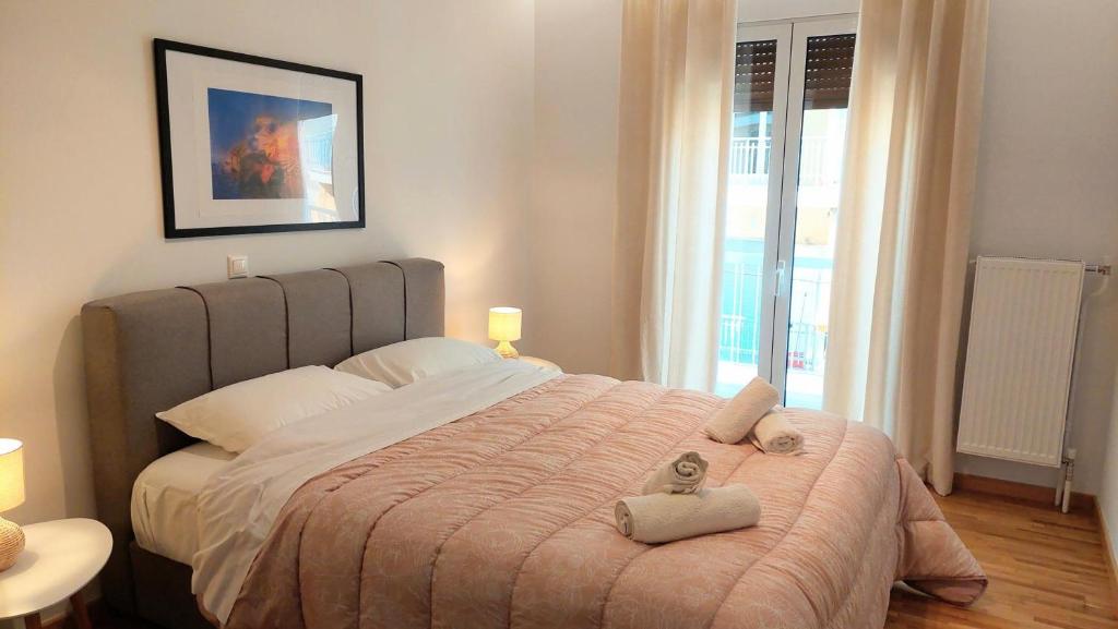 Posteľ alebo postele v izbe v ubytovaní Wonderful apartment in Acropolis